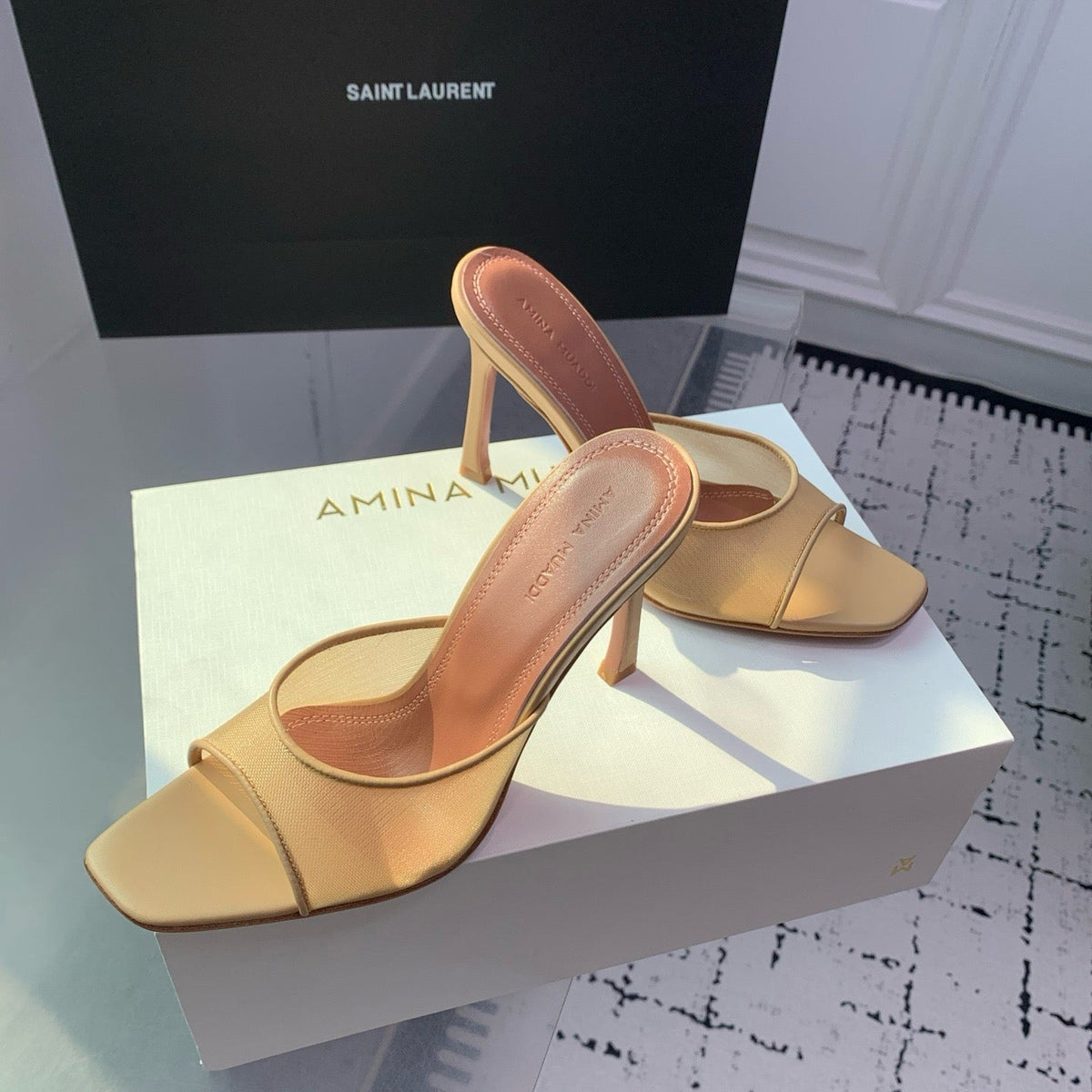 AMINA M HEELS