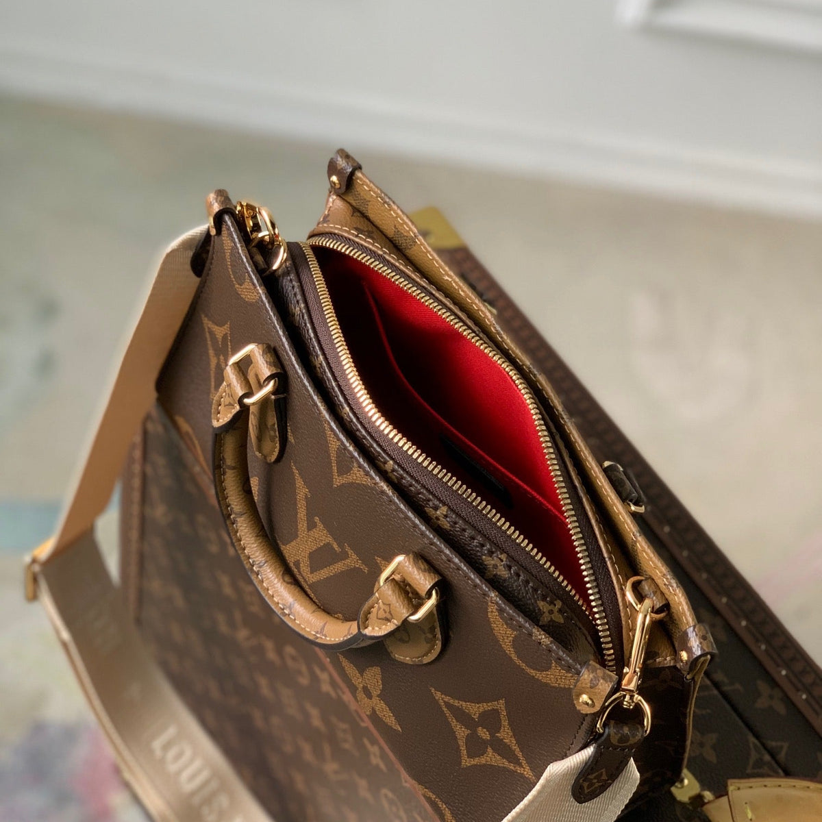 LOU ONTHEGO EAST WEST TOTE BAG