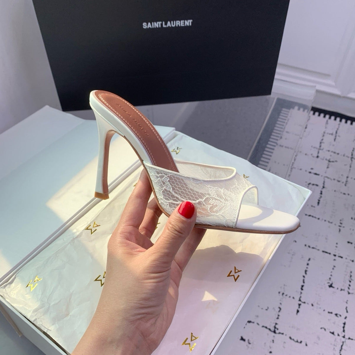AMINA M HEELS
