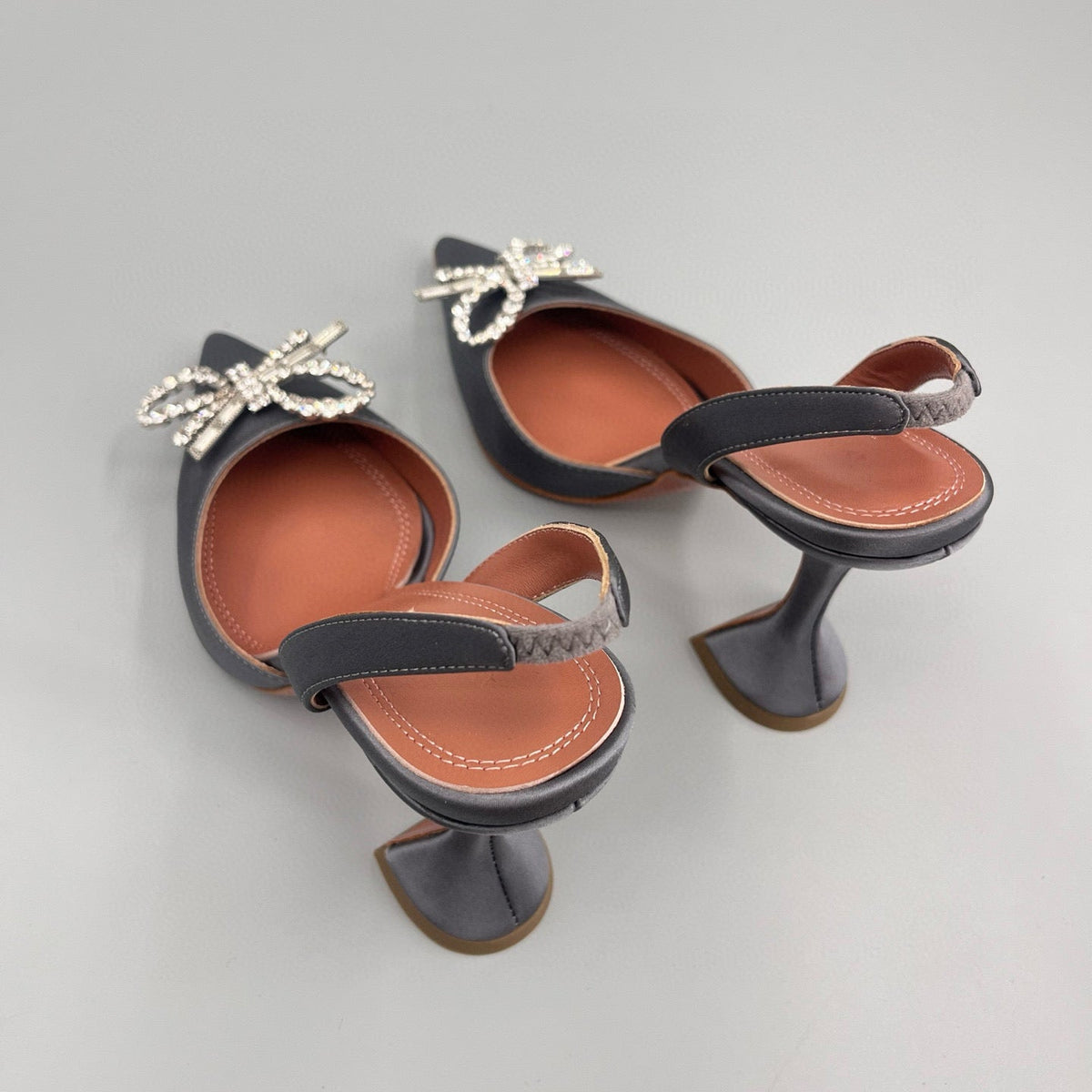 AMINA M HEELS