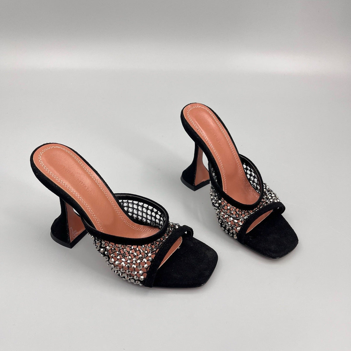 AMINA M HEELS