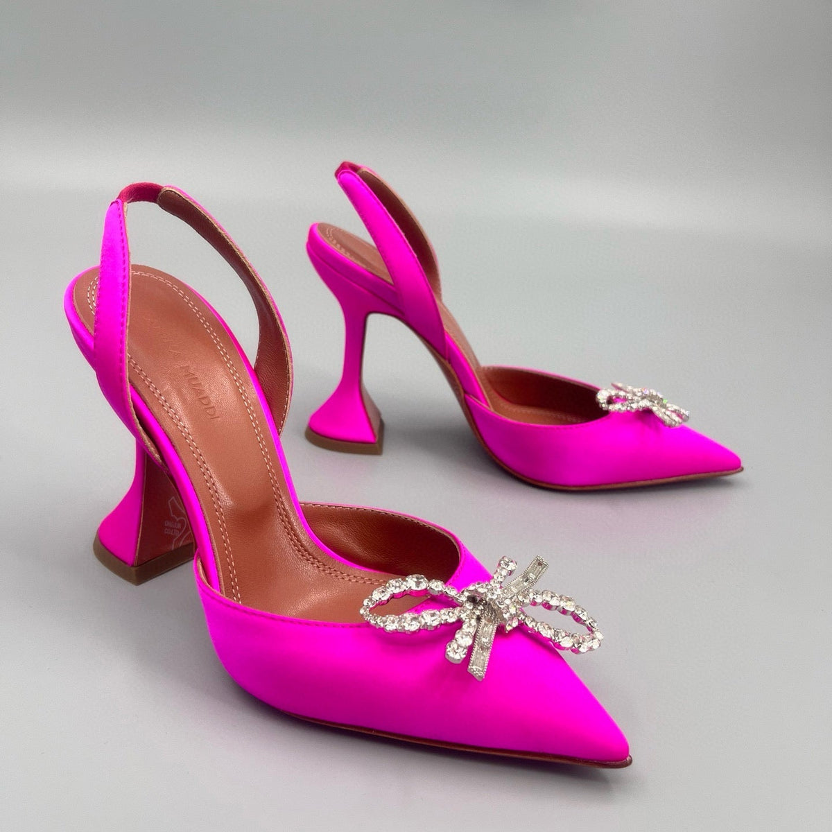 AMINA M HEELS