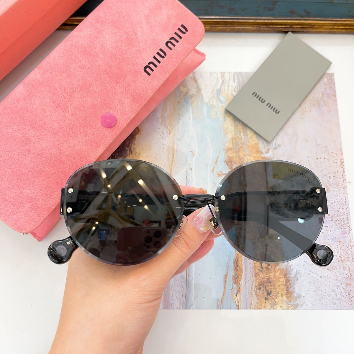 MIU M SUNGLASSES