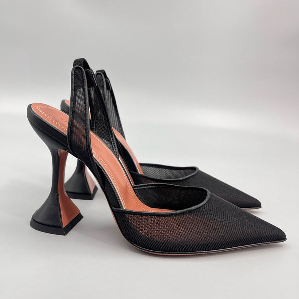 AMINA M HEELS