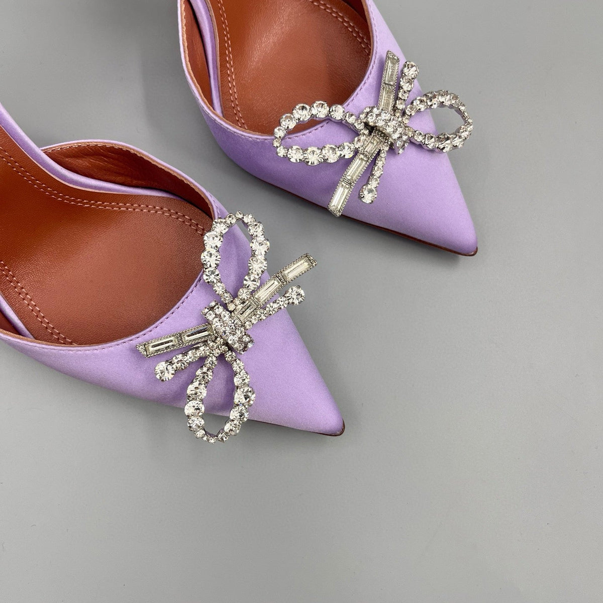 AMINA M HEELS