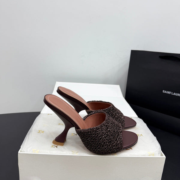AMINA M HEELS
