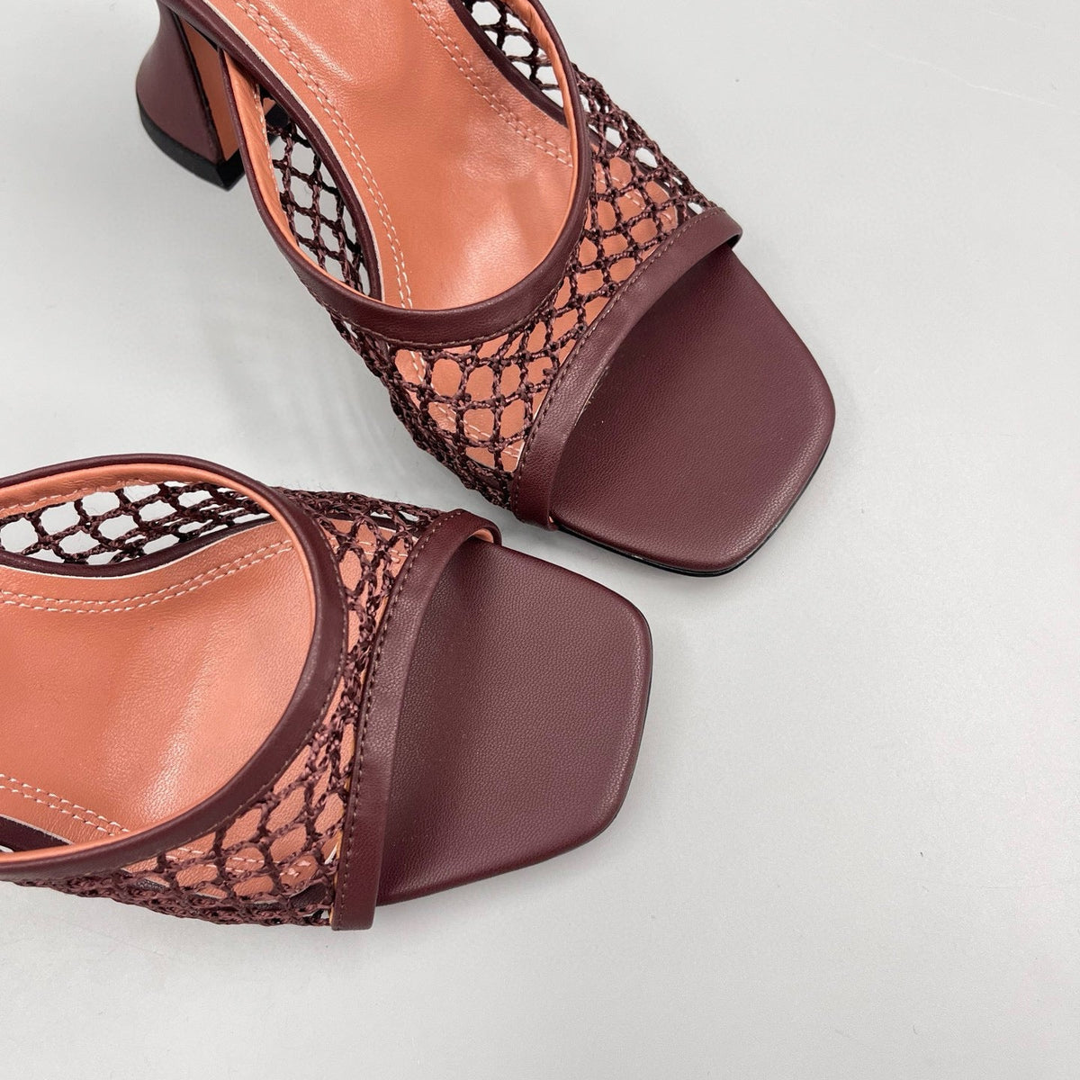 AMINA M HEELS