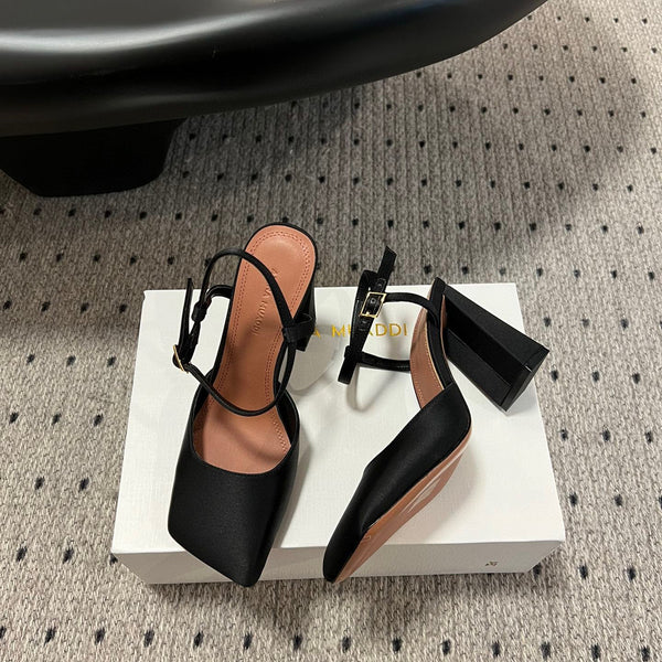 AMINA M HEELS