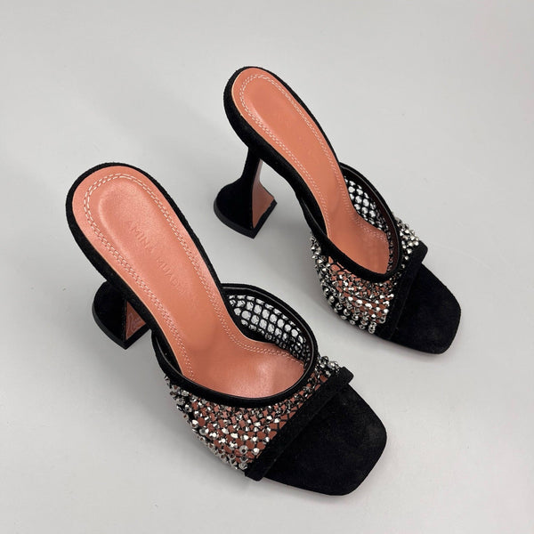 AMINA M HEELS