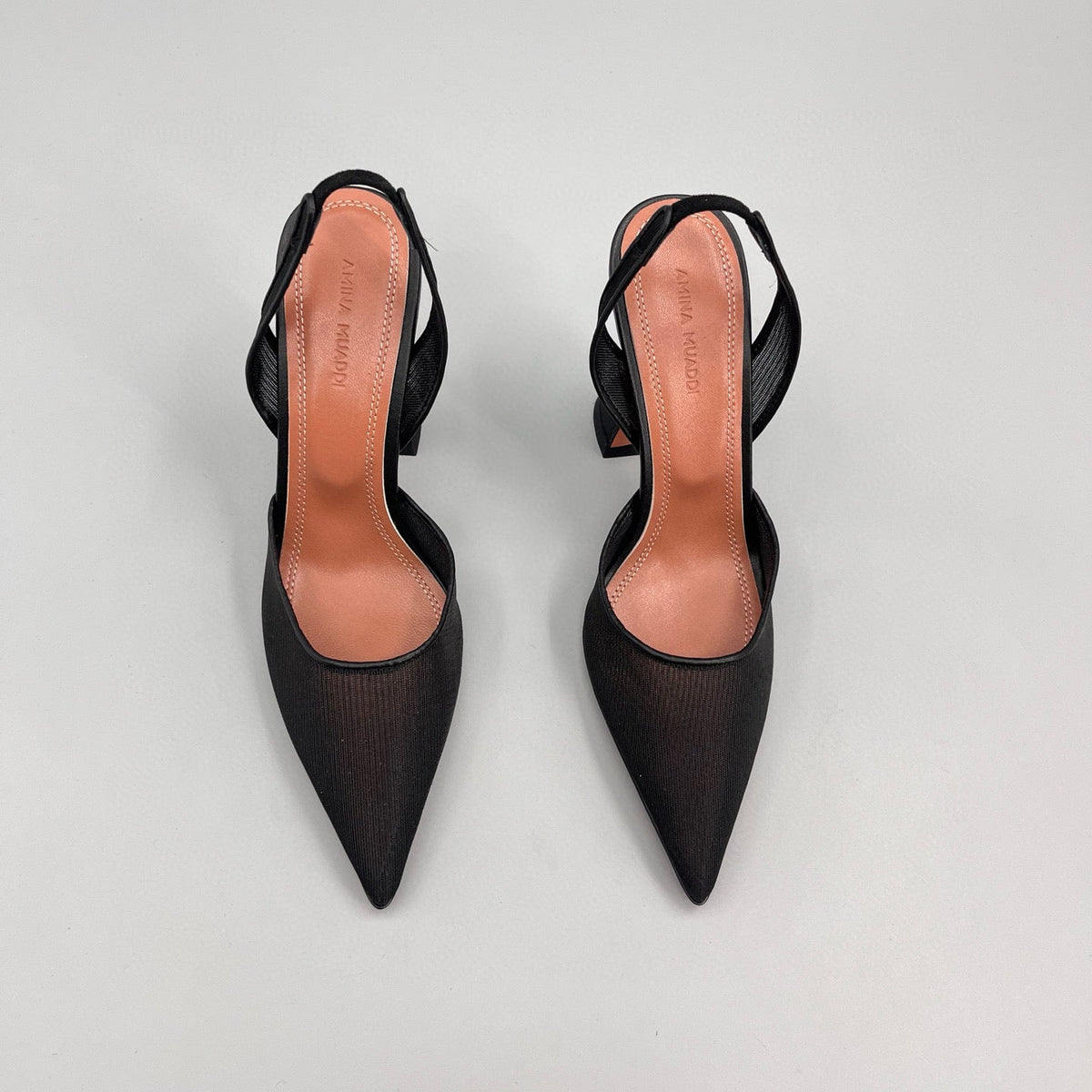 AMINA M HEELS