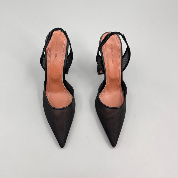 AMINA M HEELS