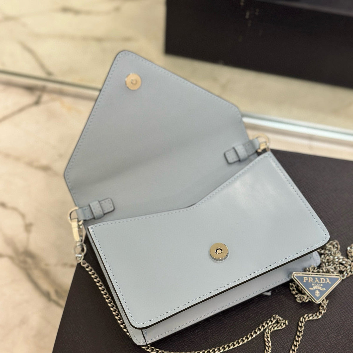PD TRIANGLE LOGO BUFFED SHOULDER BAG