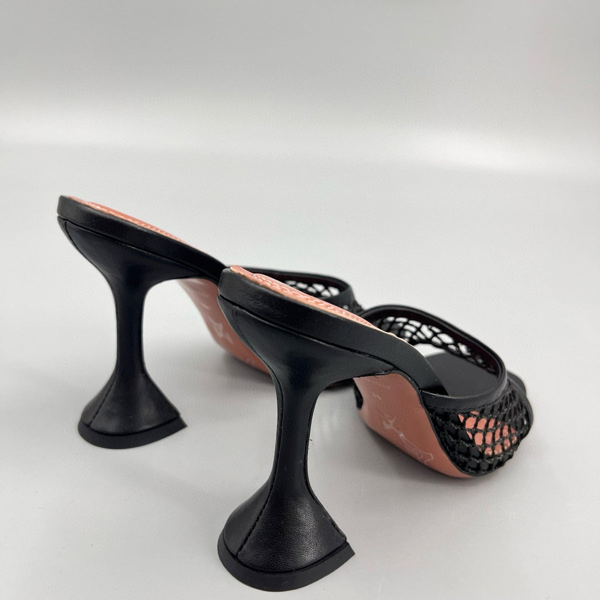AMINA M HEELS