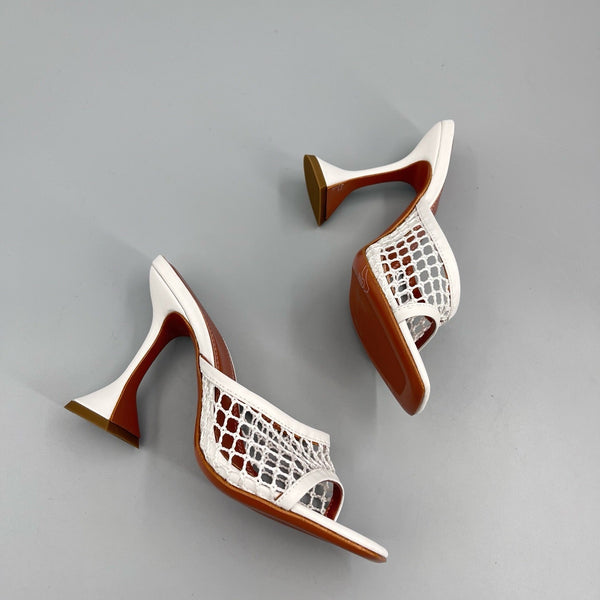 AMINA M HEELS