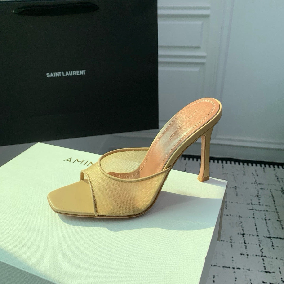 AMINA M HEELS