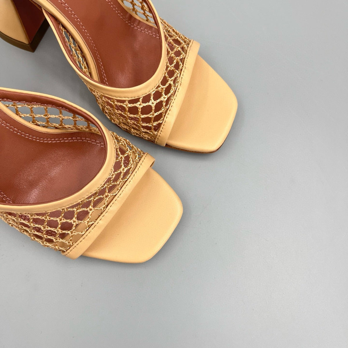 AMINA M HEELS