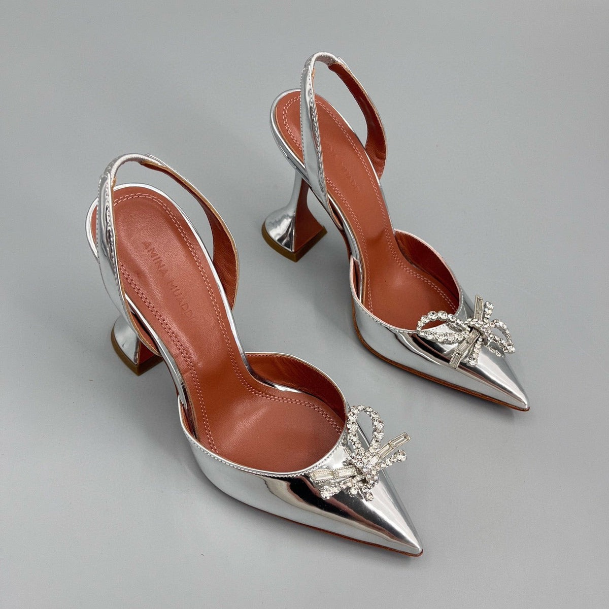 AMINA M HEELS
