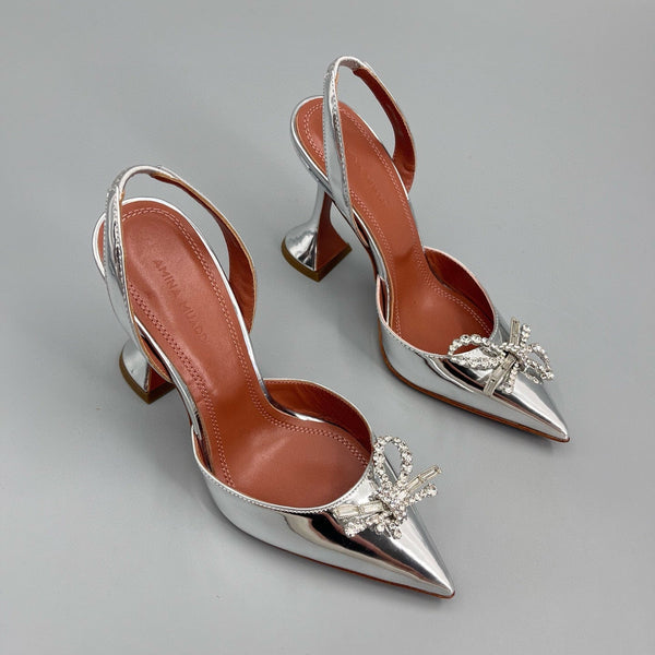 AMINA M HEELS
