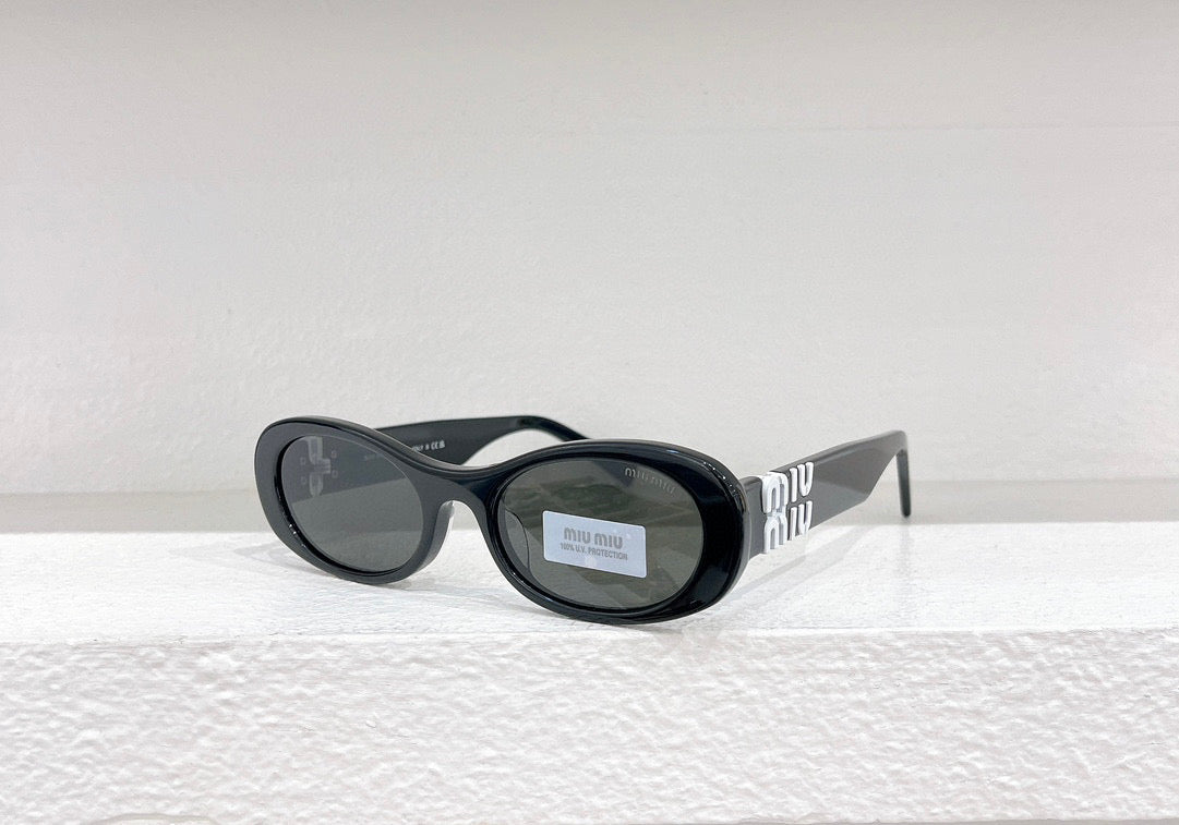 MIU M SUNGLASSES