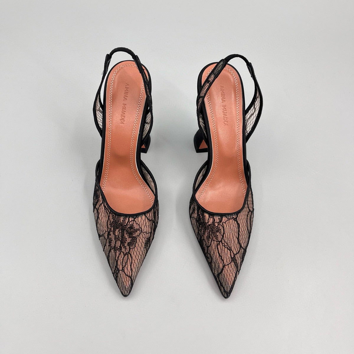 AMINA M HEELS