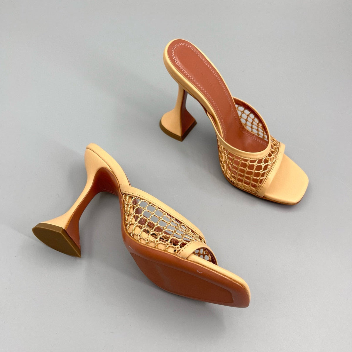 AMINA M HEELS