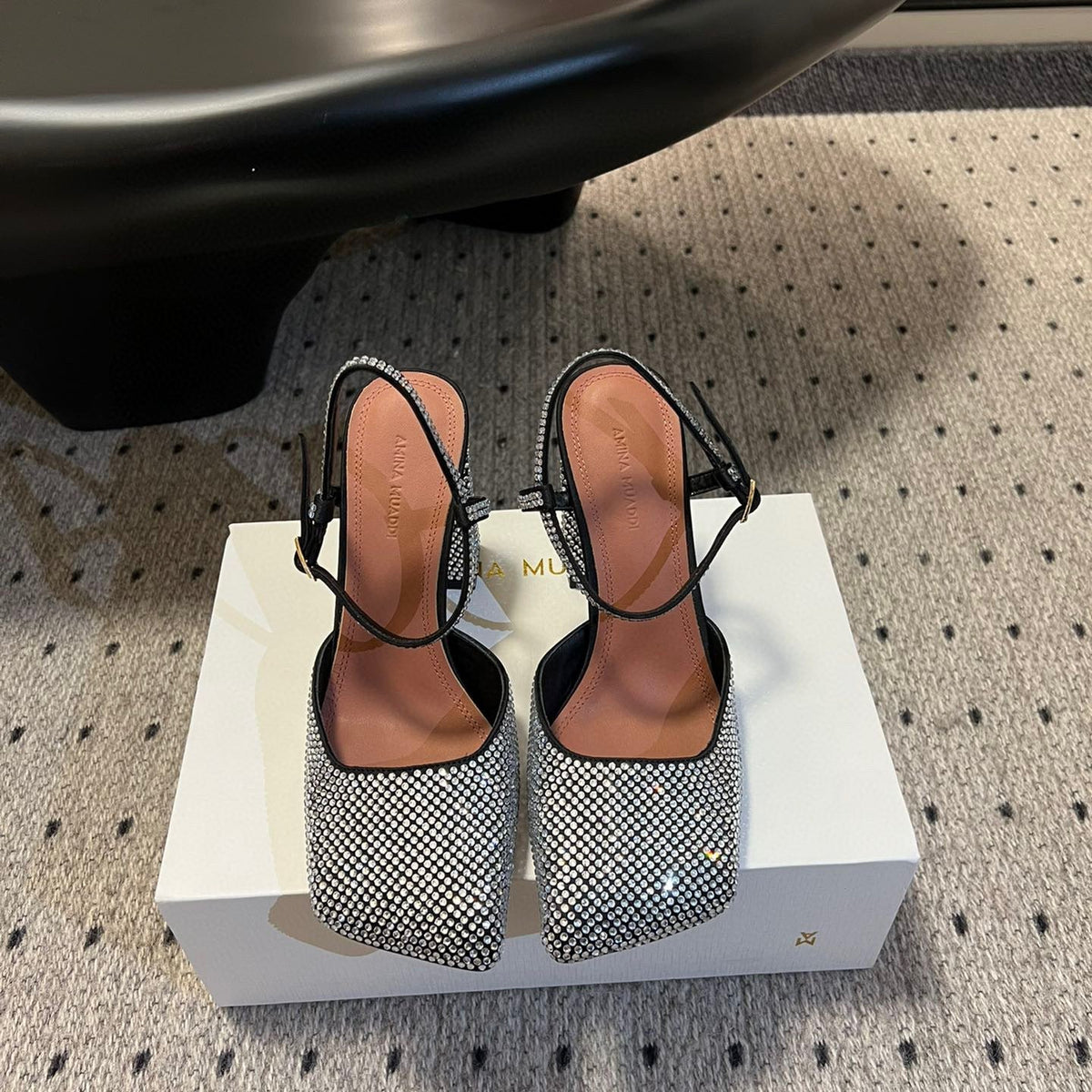 AMINA M HEELS