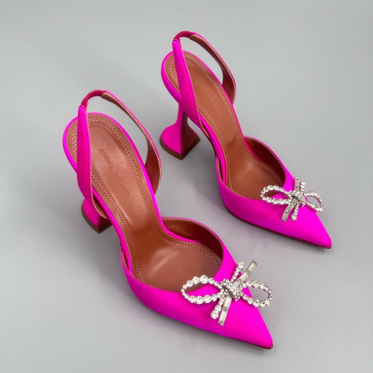 AMINA M HEELS