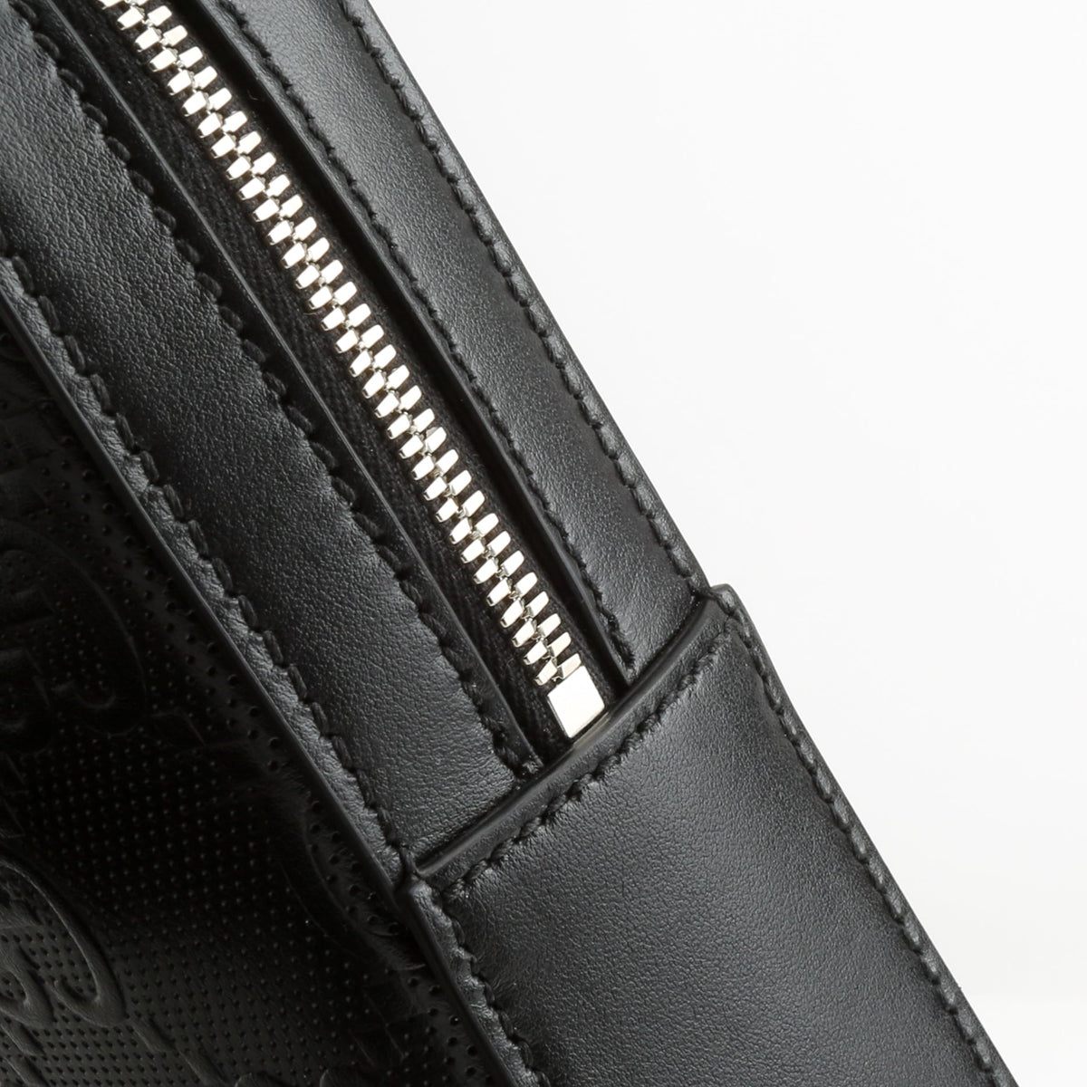 GUCCI GG Embossed Sling Bag - Black