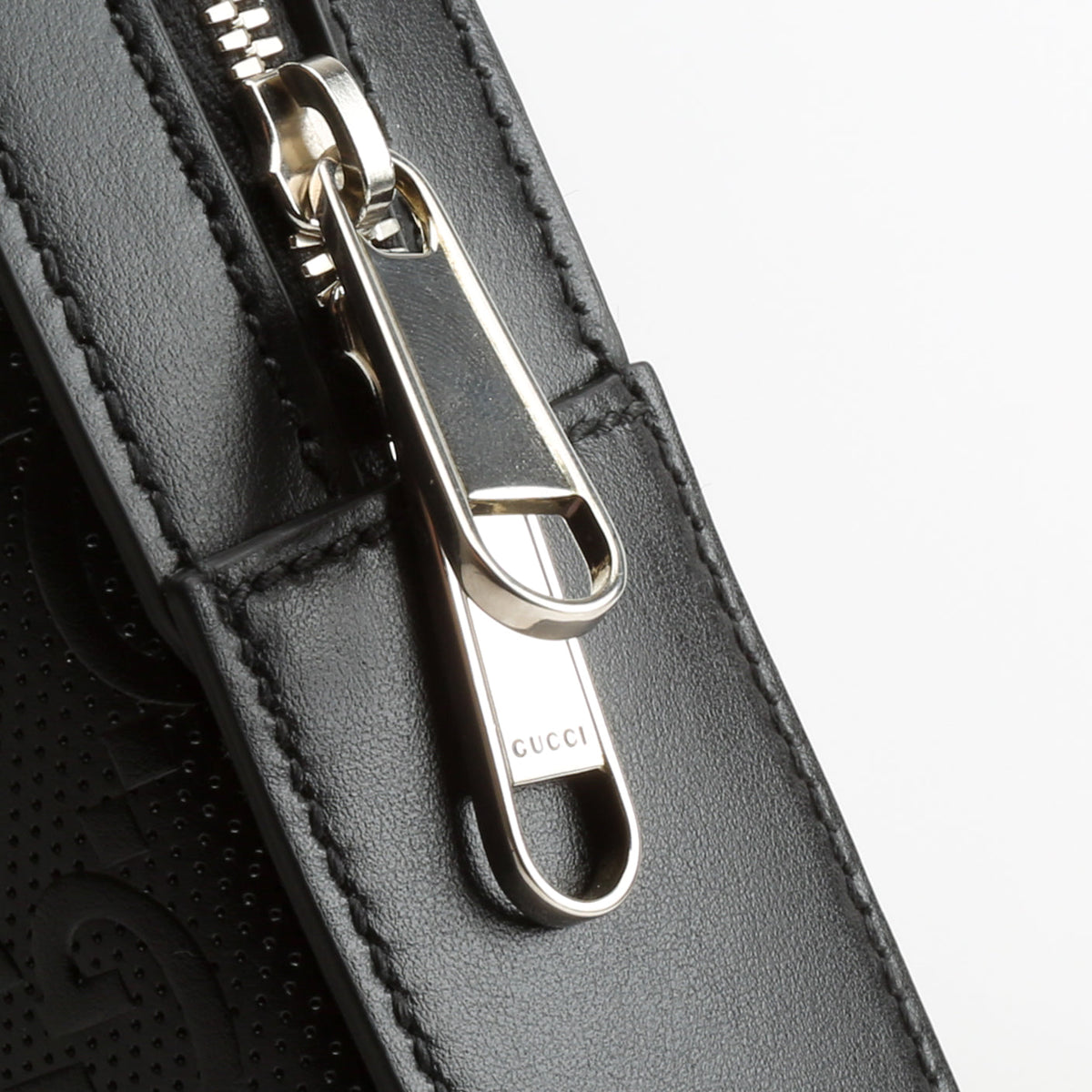 GUCCI GG Embossed Sling Bag - Black