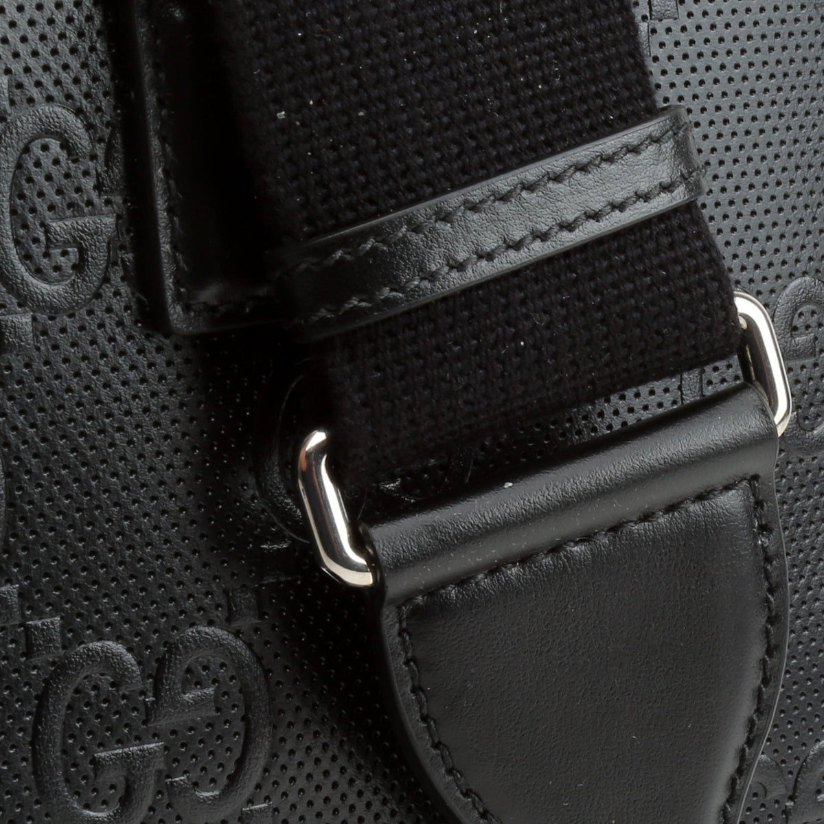 GUCCI GG Embossed Sling Bag - Black