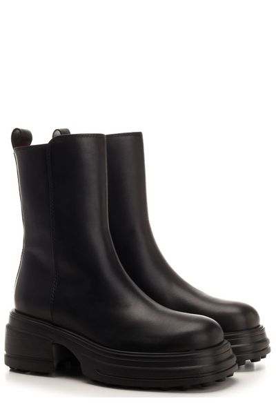 LEATHER PLATFORM ANKLE BOOTS.