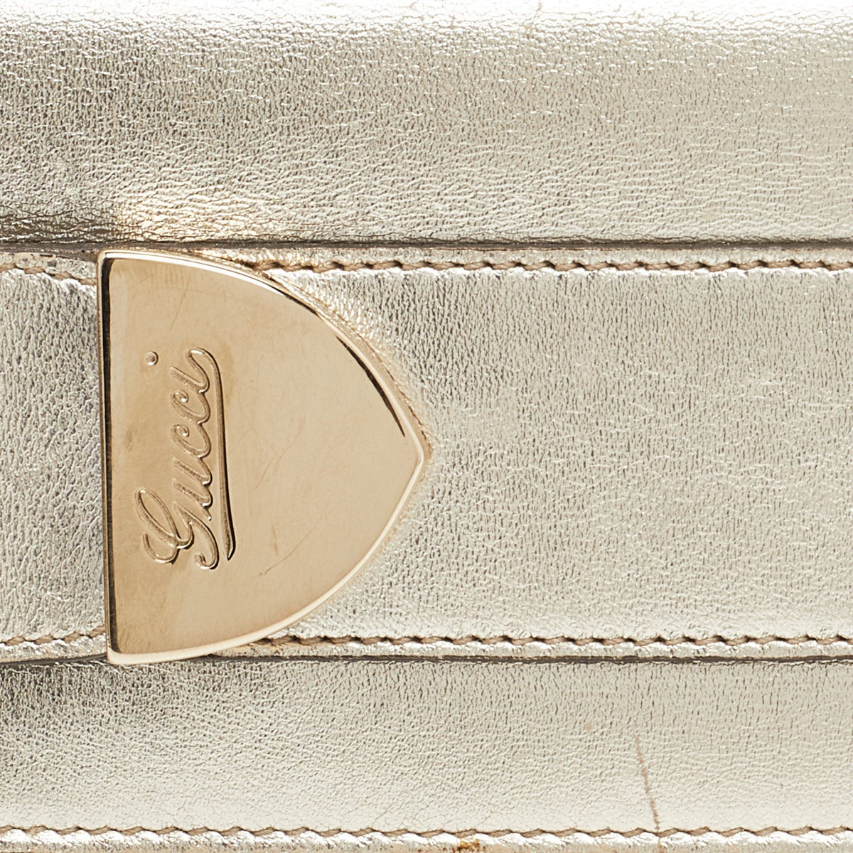 GUCCI Gold Leather Romy Clutch